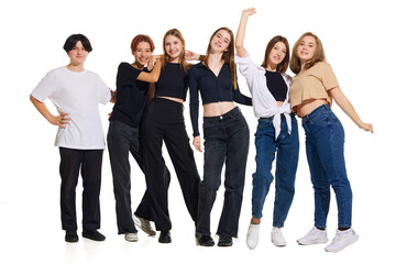 Obraz premium Full-length portrait of young attractive smiling people dressed trendy casual outfit against white studio background. Concept of beauty, youth, emotions, fashion, style, modelling. Copy space. Ad