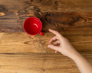 Hand Holds Cup, Empty Red Cup in Hands, Coffee Mug, Teacup, Hot Beverage Mockup