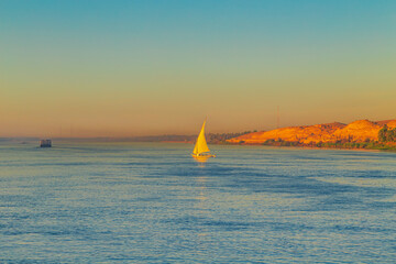 Traditional felucca boat on the Nile River.