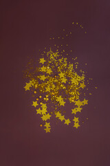 Set of sparkle glitter for decorating art and handmade products. Sparkling magical bright golden glitter stars glow.