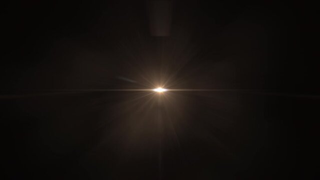 Abstract loop center flickering glow gold star optical flare shine light ray long arm animation on black background.