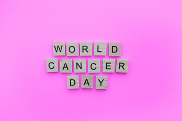 February 4, World Cancer Day, minimalistic banner with the inscription in wooden letters