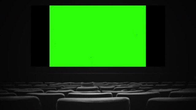 Movie Theater Green Screen Projection Old Film Texture Cinema Seats Zoom In. Green screen projection, for replacement, on an empty movie theater, zoom in. Old film texture