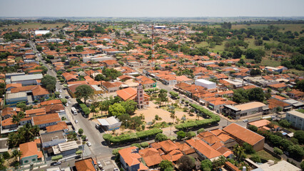 Panoramic aerial view of the city of Nova Aliança-SP with general view of the urban area and the chapel and central square on a sunny day