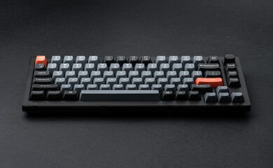 Modern mechanical keyboard for your computer. Gray keyboard with orange accent keys	 - obrazy, fototapety, plakaty