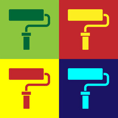 Pop art Paint roller brush icon isolated on color background. Vector
