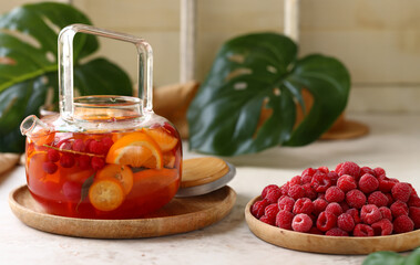 fruit berry citrus tea in a glass teapot