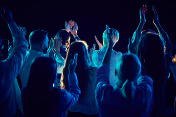 Group of of different people attending concert, stand up show, cheerfully spending time with jokes...