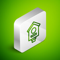 Isometric line Bird house icon isolated on green background. Nesting box birdhouse, homemade building for birds. Silver square button. Vector