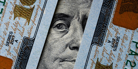 Benjamin Franklin's look on a hundred dollar bill. Benjamin Franklin portrait macro usa dollar...