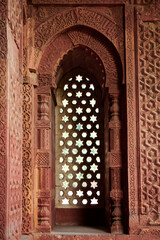 Decorative window shutters of Alai Darwaza landmark part of Qutb complex in South Delhi, India,