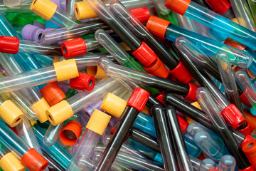 test tubes with hazardous biological substances in a microbiological laboratory for disposal