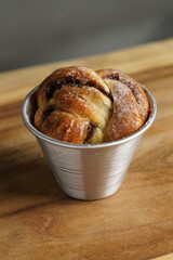 Chocolate muffin in a cup on the table food photography