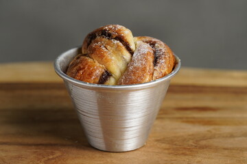 Chocolate muffin in a cup on the table food photography