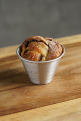 Chocolate muffin in a cup on the table food photography