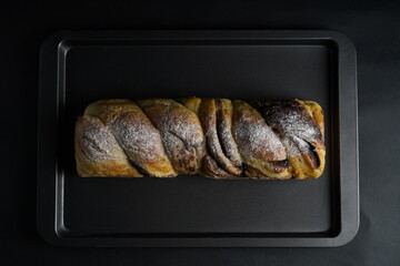 Chocolate Bread and butter cake with black background