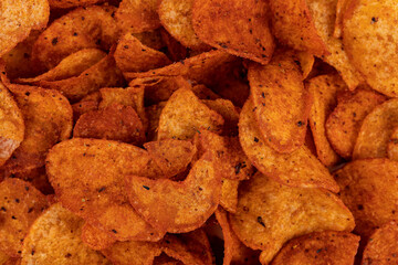spicy red potato chips close up photo