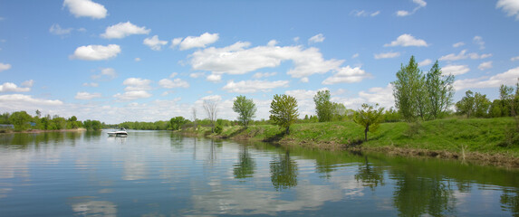 Fototapeta na wymiar Panoramic view of an arm of the St. Lawrence River in the Boucherville Islands