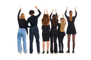 Fototapeta na wymiar Rear view portrait of happy, joyful people, models dressed smart casual cloth raising hands up on white studio background. Copy space. Concept of beauty, youth, emotions, fashion, style, modelling. ad