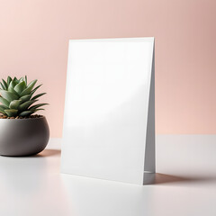 Blank white poster mock up on white table