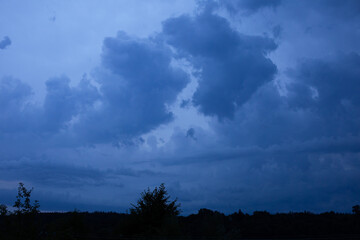 Dark storm clouds before rain. Natural weather dramatic background.