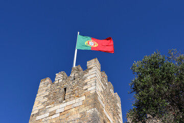 Portuguese national flag on the Saint George's Castle (Castelo de São Jorge) in Lisbon