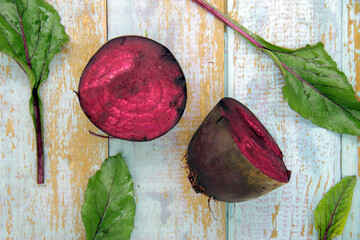 Fresh beets on a wooden surface.  Best diet background.