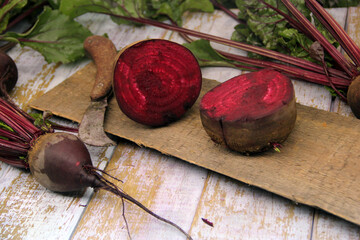 Fresh beets on a wooden surface.  Best diet background.