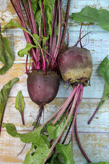 Fresh beets on a wooden surface.  Best diet background.