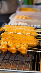 sausages, fish balls, grilled with hot charcoal