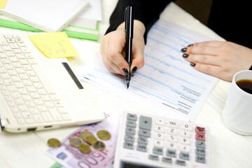 Accountant fill italian tax form F24 Unified payment model in end of tax period. Taxation and...