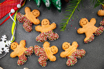 gingerbread man christmas cookie cinnamon, vanilla, ginger christmas sweet dessert holiday baking treat new year meal food snack on the table copy space food background