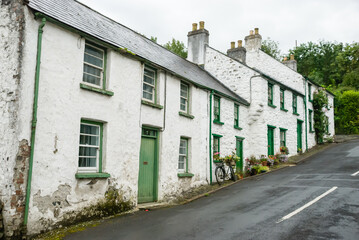 Fototapeta na wymiar Whitewashed houses in the Northern Ireland village of Gleno