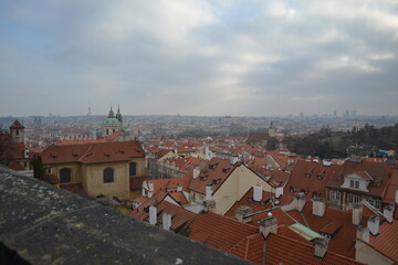Fototapeta na wymiar Orange. Roofs. View. town. Tile. Megapolis. Ancient.