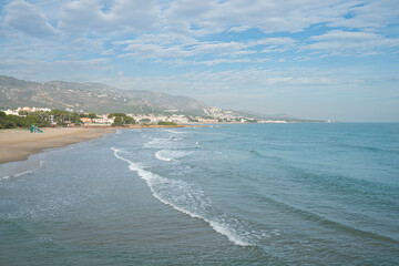 Beach on a sunny day. Mediterranean coast, sea. Alcossebre, Valencia Spain. 