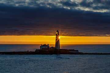 lighthouse at sunrise
