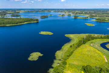 Drone shot on summer lake. Bird-eye view on summer lake.
