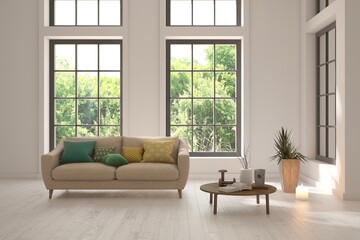 Bright interior design with modern furniture and summer landscape in window. 3D illustration
