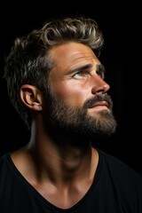 Obraz premium portrait of a handsome man in profile looking up