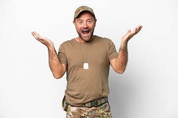 Middle age military with dog tag isolated on white background with shocked facial expression