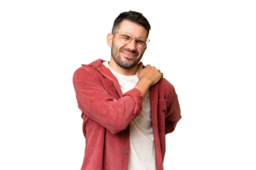 Young handsome caucasian man over isolated chroma key background suffering from pain in shoulder for having made an effort