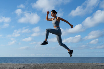 athletic brunette girl doing fitness doing exercises leading a healthy lifestyle