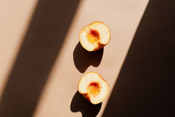 Still life with peaches. Photos in natural colors. Minimal food concept with dramatic light and...