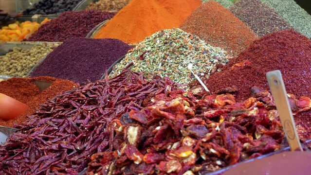 Arabic Spices in Market . Selective blurring on piles of spices of different colors and flavors used in Turkish cuisine in Istanbul Egyptian spice market, called Misir Carsisi, in Turkey.