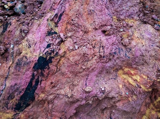 Tropical swamp soils. Bright red-yellow purple soils of Africa. Erosion of an old lateritic soil. Equatorial Guinea.