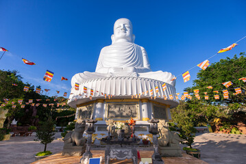 Big white budhha image at Ba Na Hill french village on the hill. The famous toursit attraction in...