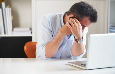 Naklejka premium Phone call, privacy or businessman in office talking on mobile conversation as communication. Laptop, illegal or corrupt manager in discussion or speaking of bribery, fraud or money laundering secret
