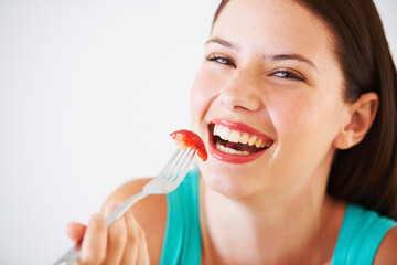 Health, diet and portrait of woman with strawberry eating for nutrition, wellness or snack in...