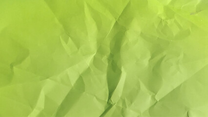 Clean green paper, wrinkled, abstract background.