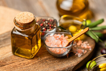 olive oil and on wooden background